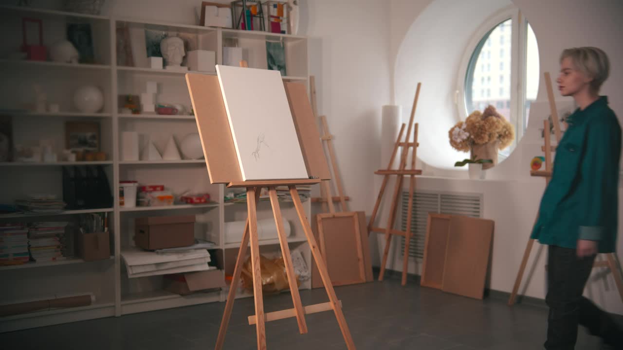 Free Stock Video Young Artist Drawing On Canvas At Her Workshop Live Wallpaper