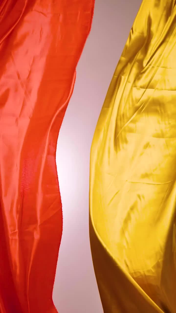 Free Stock Video Yellow And Orange Fabrics Waving Together Live Wallpaper