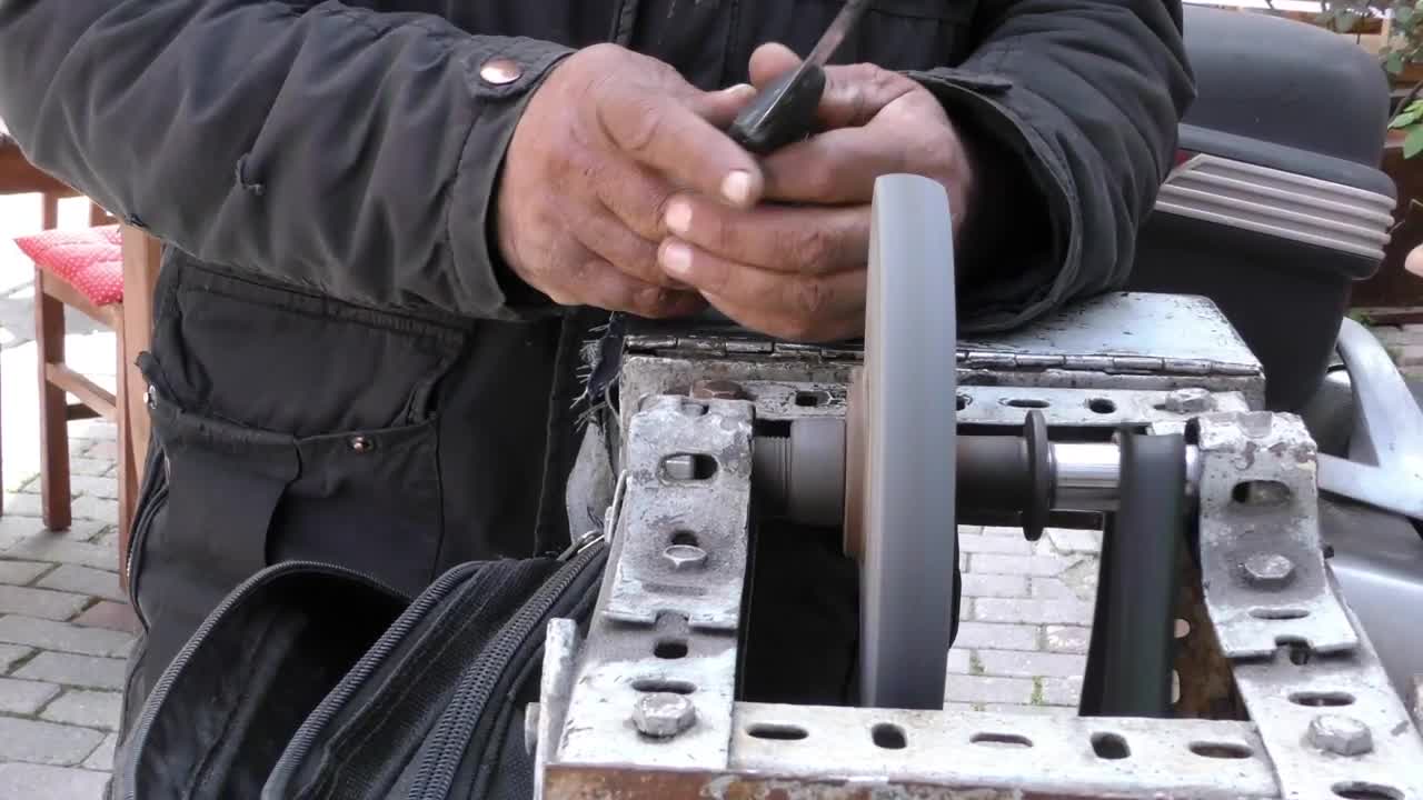 Free Stock Video Worker Sharpening His Tool On A Machine Live Wallpaper