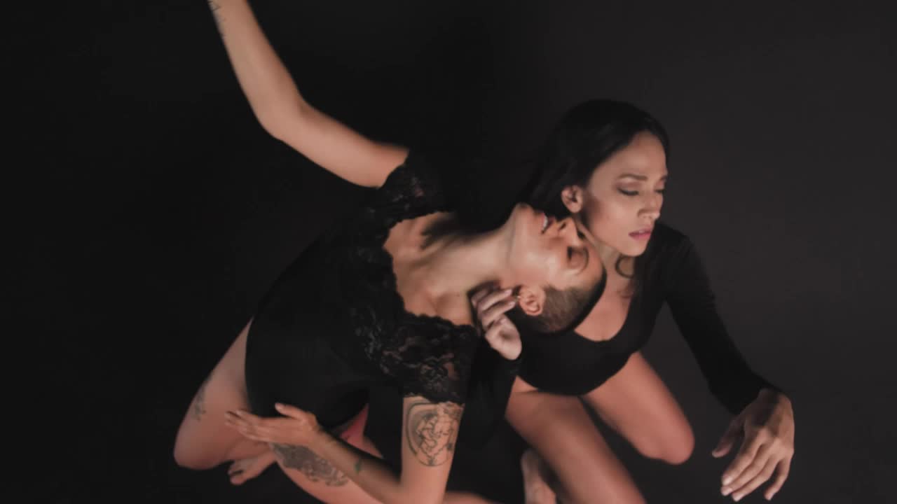 Free Stock Video Women Dancing Together On A Dark Background Live Wallpaper