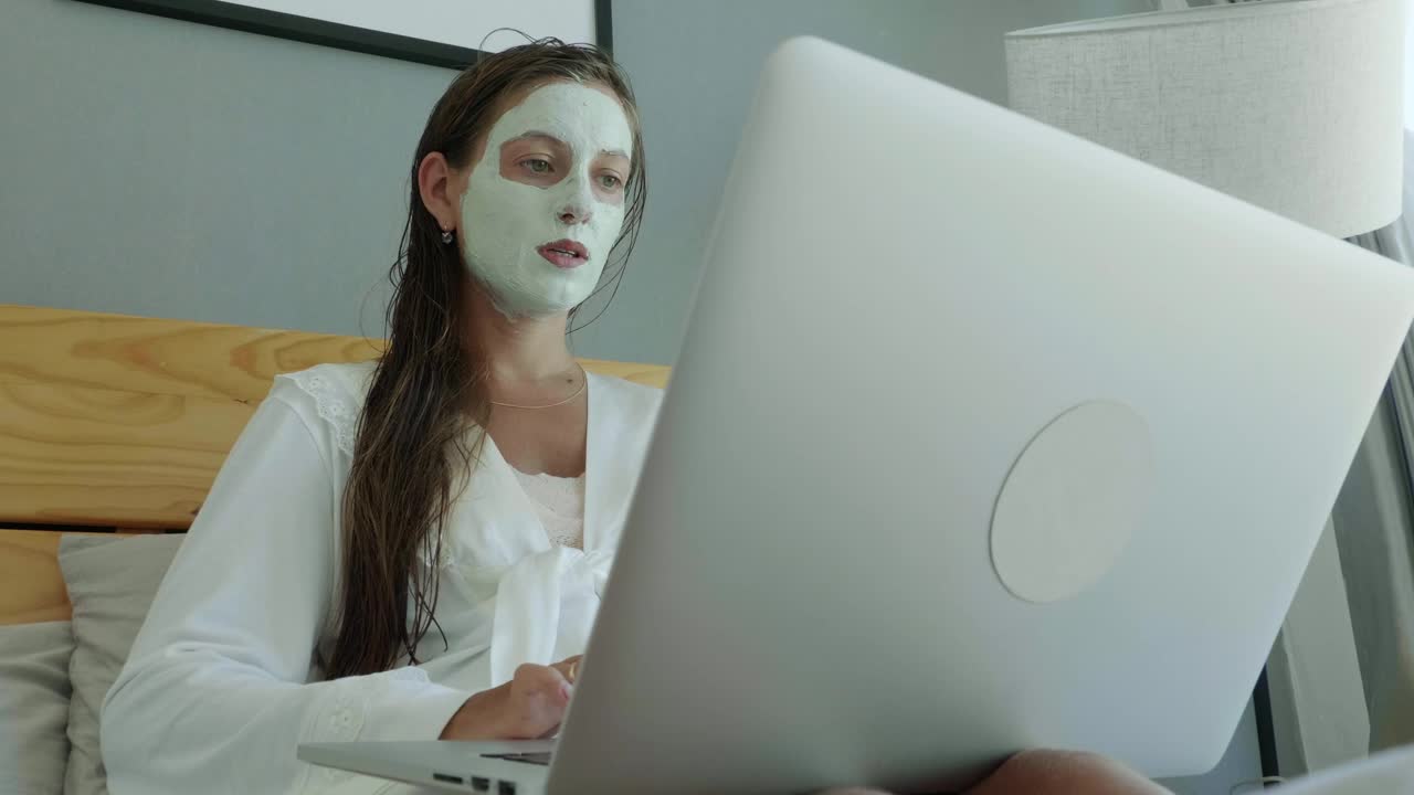 Free Stock Video Woman Working On The Bed With A Beauty Face Mask Live Wallpaper