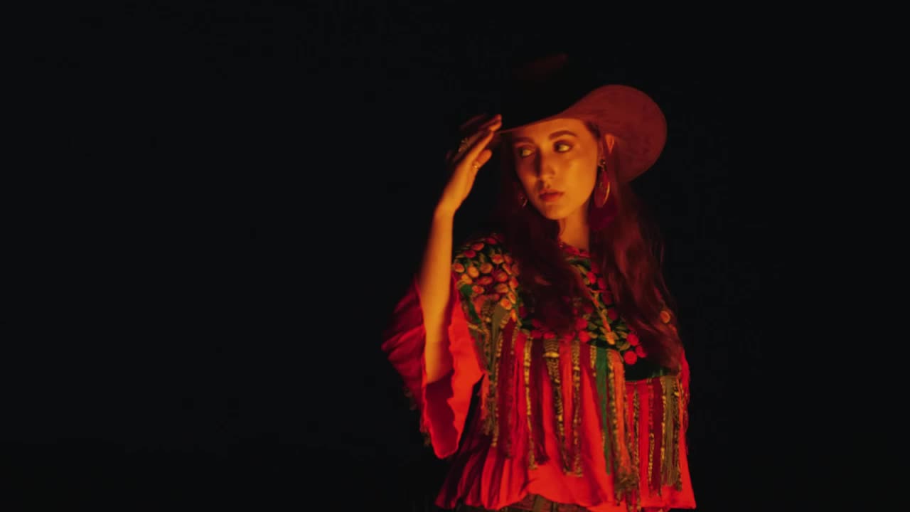 Free Stock Video Woman With Mexican Style Under The Light Of A Bonfire Live Wallpaper
