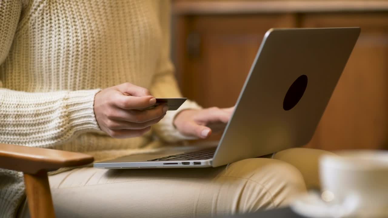 Free Stock Video Woman With Laptop Holding A Credit Card Live Wallpaper