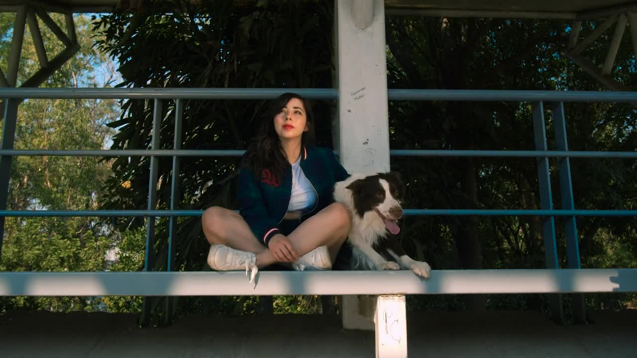 Free Stock Video Woman With Dog Sitting On Balcony Live Wallpaper