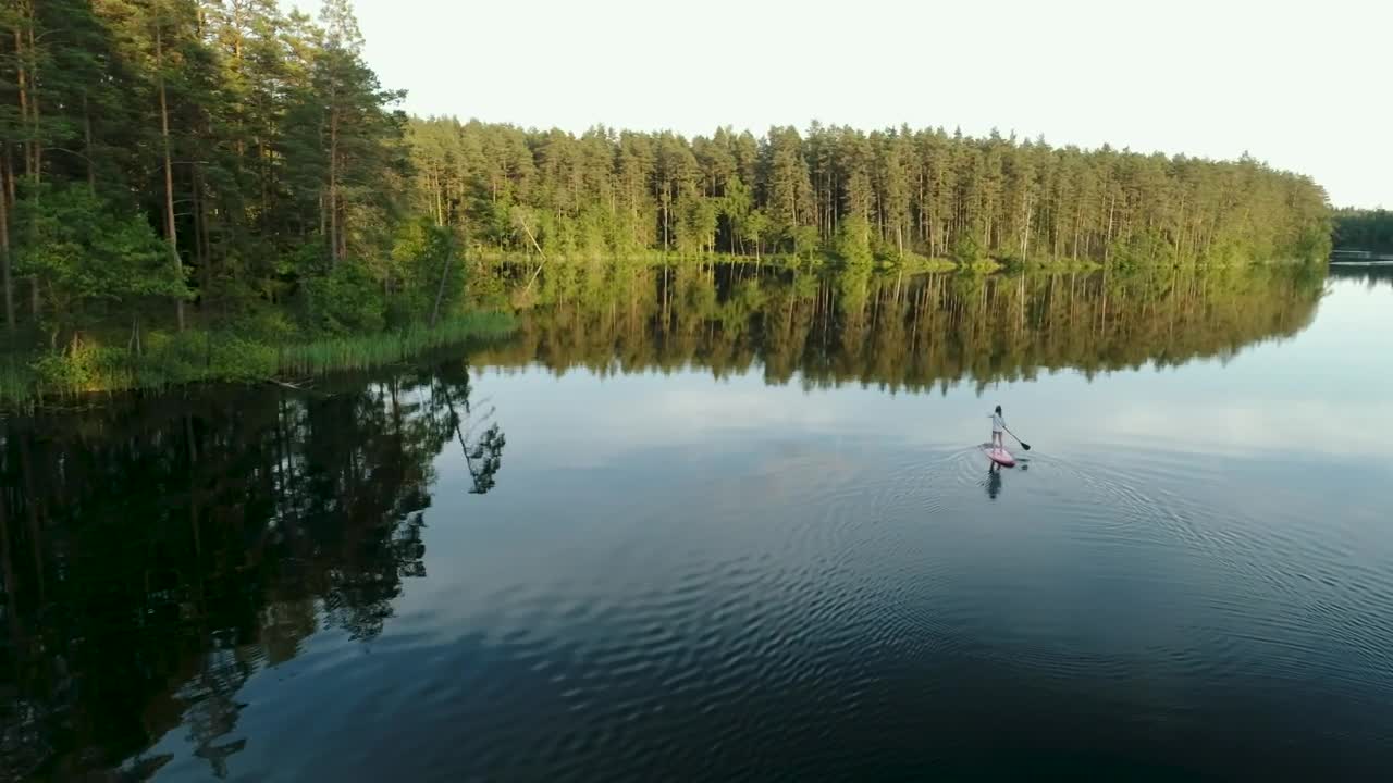 Free Stock Video Woman Wandering In Nature On A Paddleboard Live Wallpaper