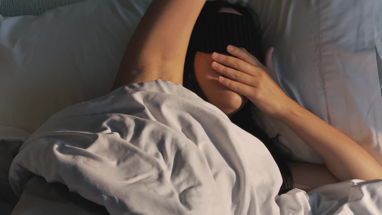 Free Stock Video Woman Waking Up Peacefully Taking Off Her Mask Live Wallpaper