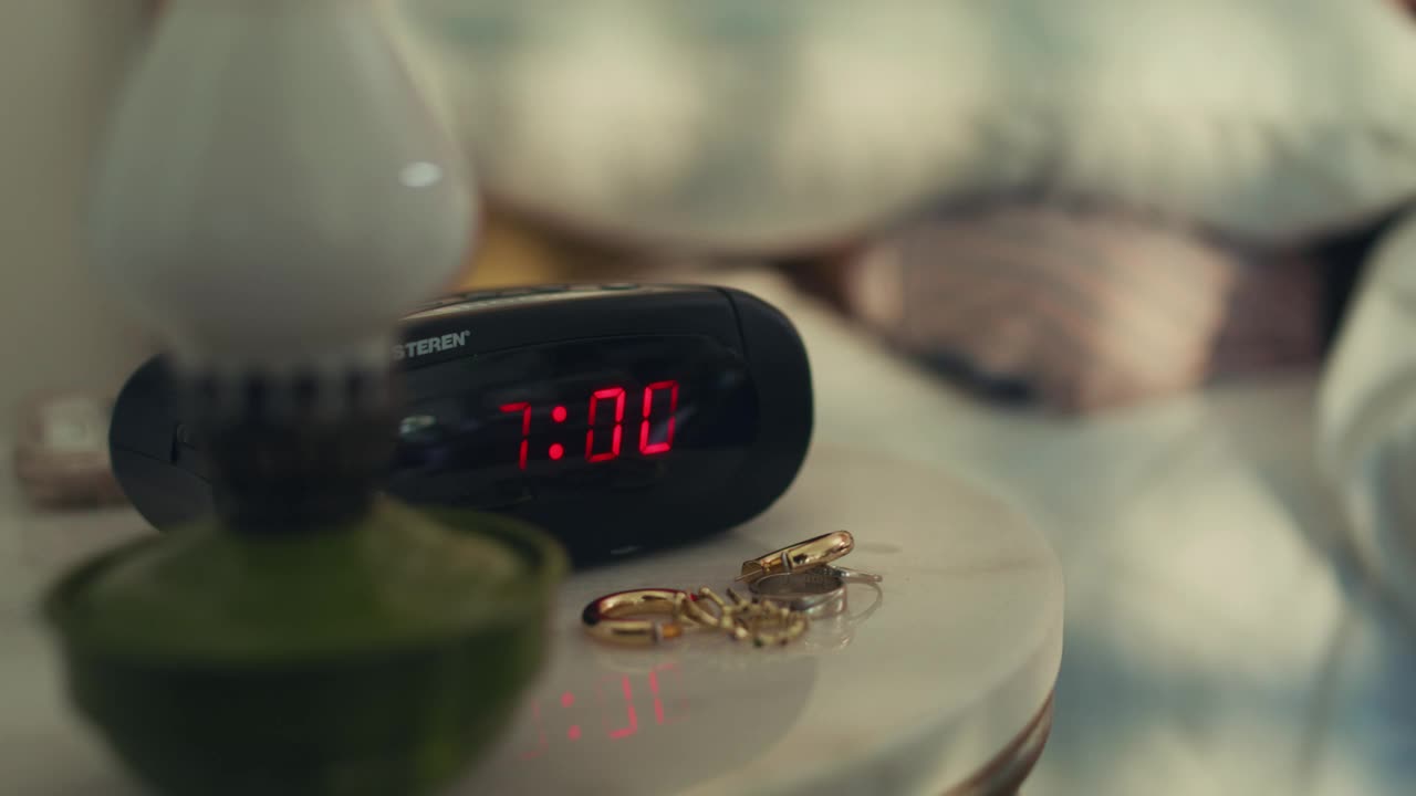 Free Stock Video Woman Turning Off Her Alarm Clock Live Wallpaper