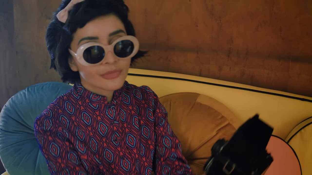 Free Stock Video Woman Taking A Selfie With An Old Camera Live Wallpaper