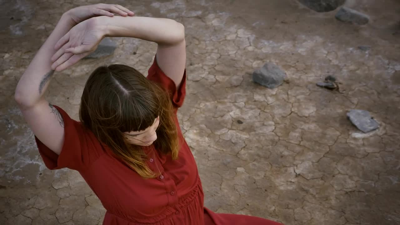 Free Stock Video Woman Stretching Her Body Sitting On The Ground In A Live Wallpaper