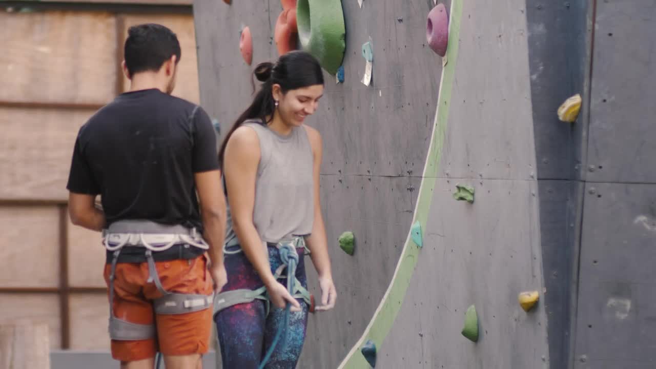 Free Stock Video Woman Starting To Climb A Mountaineering Wall Live Wallpaper