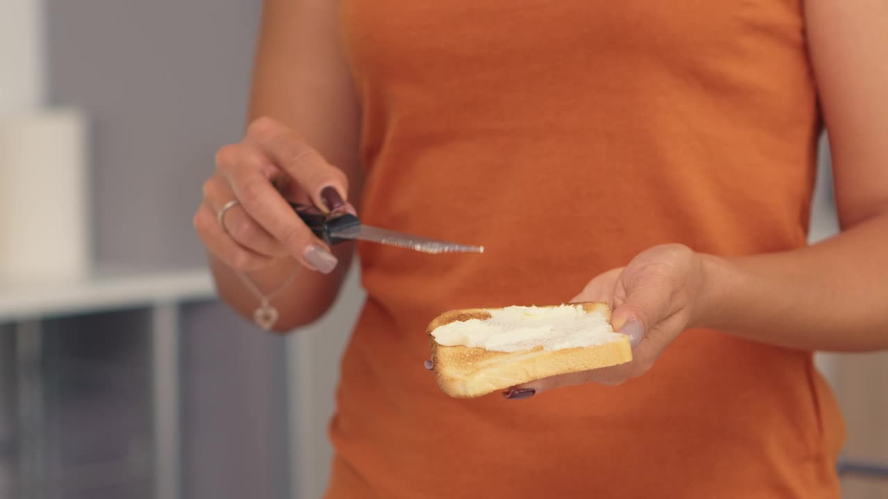 Free Stock Video Woman Spreading Butter On Toast Live Wallpaper