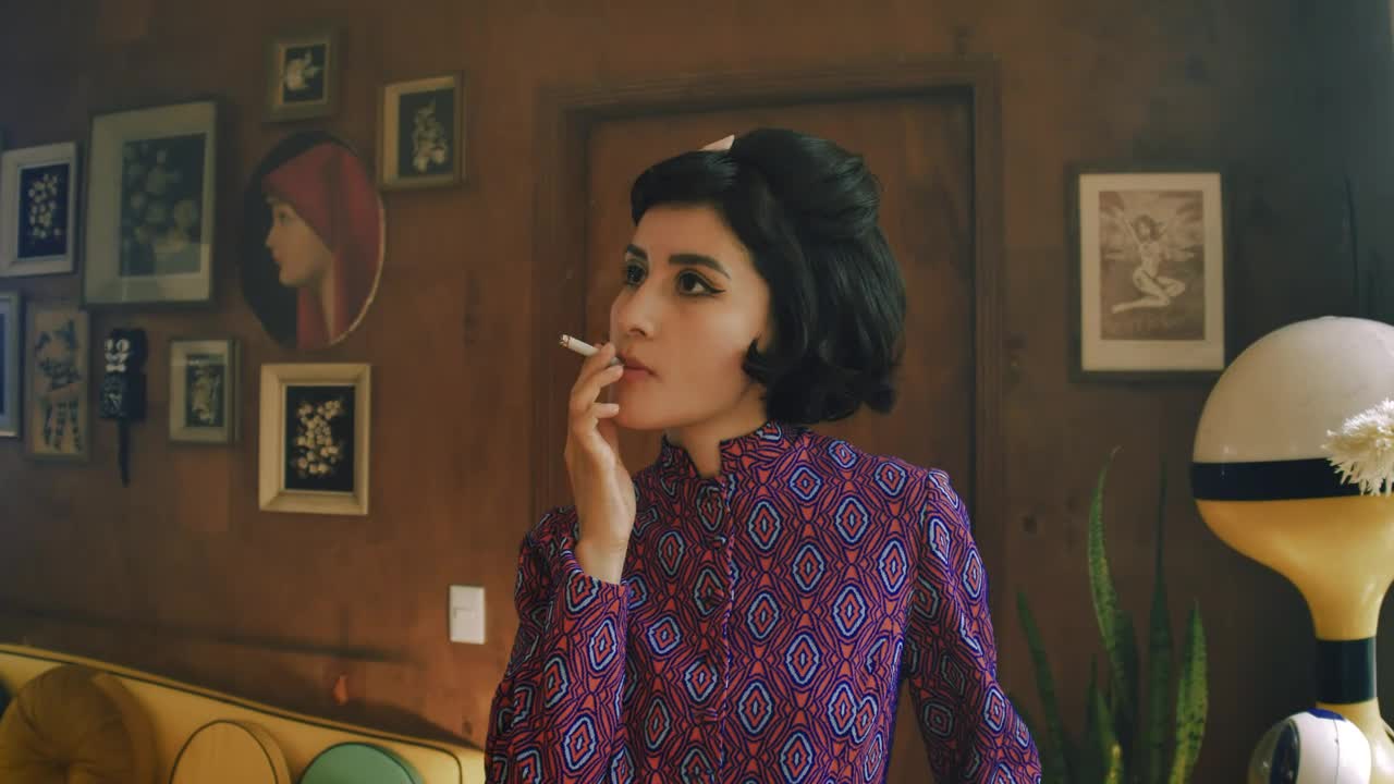Free Stock Video Woman Smoking In A Living Room Live Wallpaper