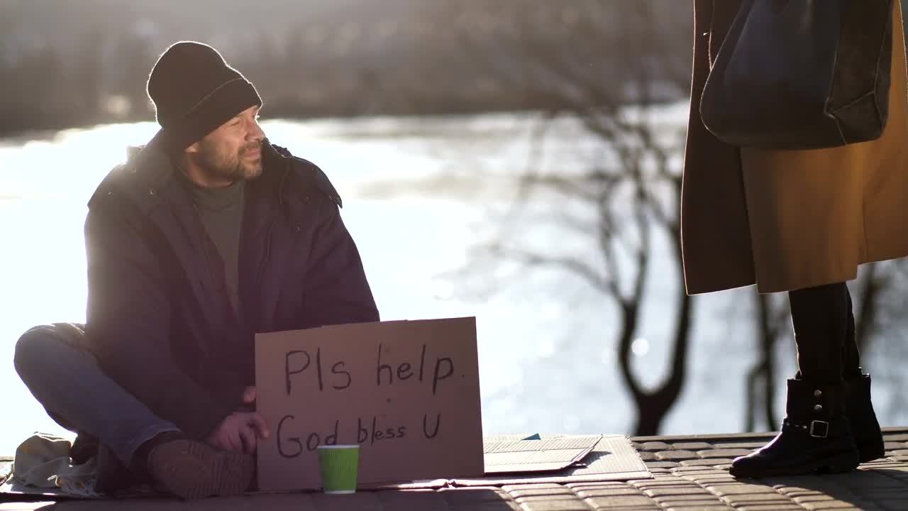 Free Stock Video Woman Sits Next To A Homeless Man And Shares Food Live Wallpaper