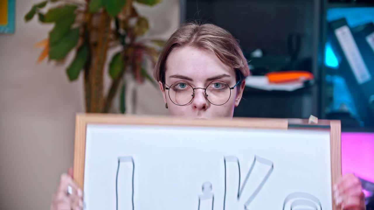 Free Stock Video Woman Showing A Sign That Says Like Live Wallpaper