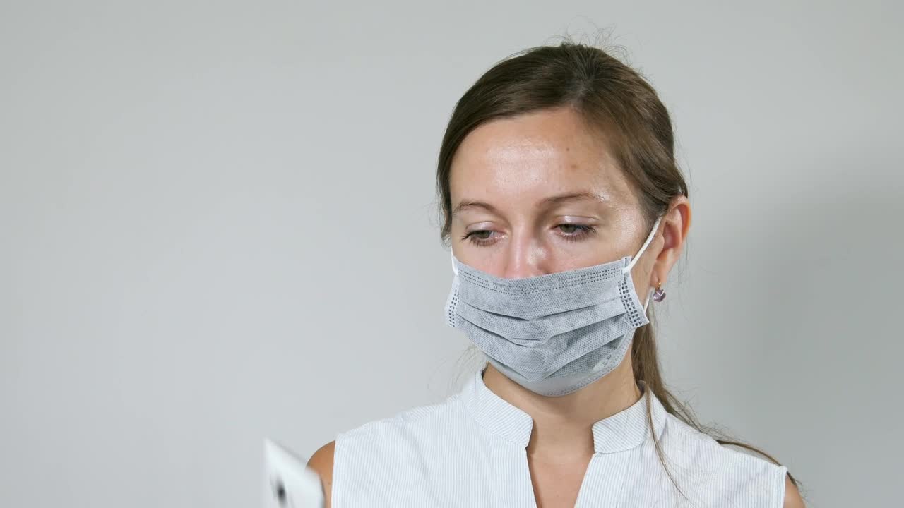 Free Stock Video Woman Sanitizing Her Mobile Phone Live Wallpaper