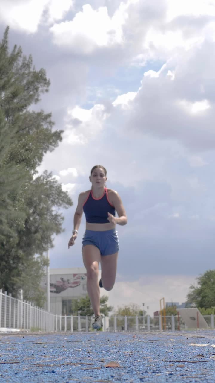 Free Stock Video Woman Running Above The Camera On A Running Track Live Wallpaper