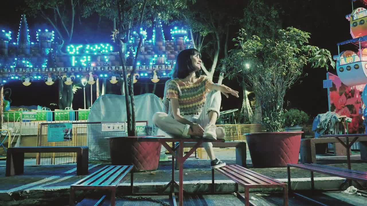 Free Stock Video Woman Resting In An Amusement Park Live Wallpaper