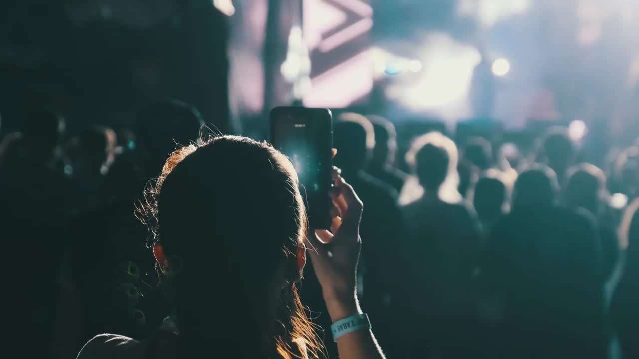 Free Stock Video Woman Recording A Story From A Concert Live Wallpaper