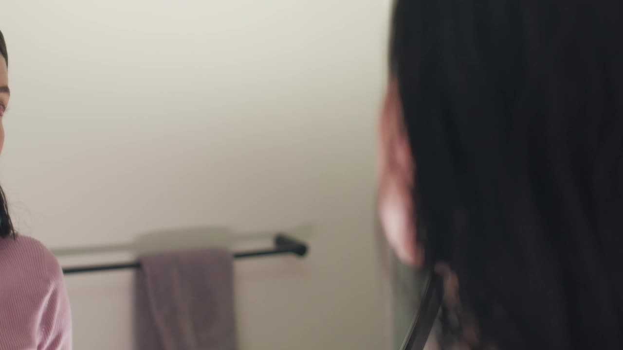 Free Stock Video Woman Putting On Makeup In Front Of The Mirror Live Wallpaper