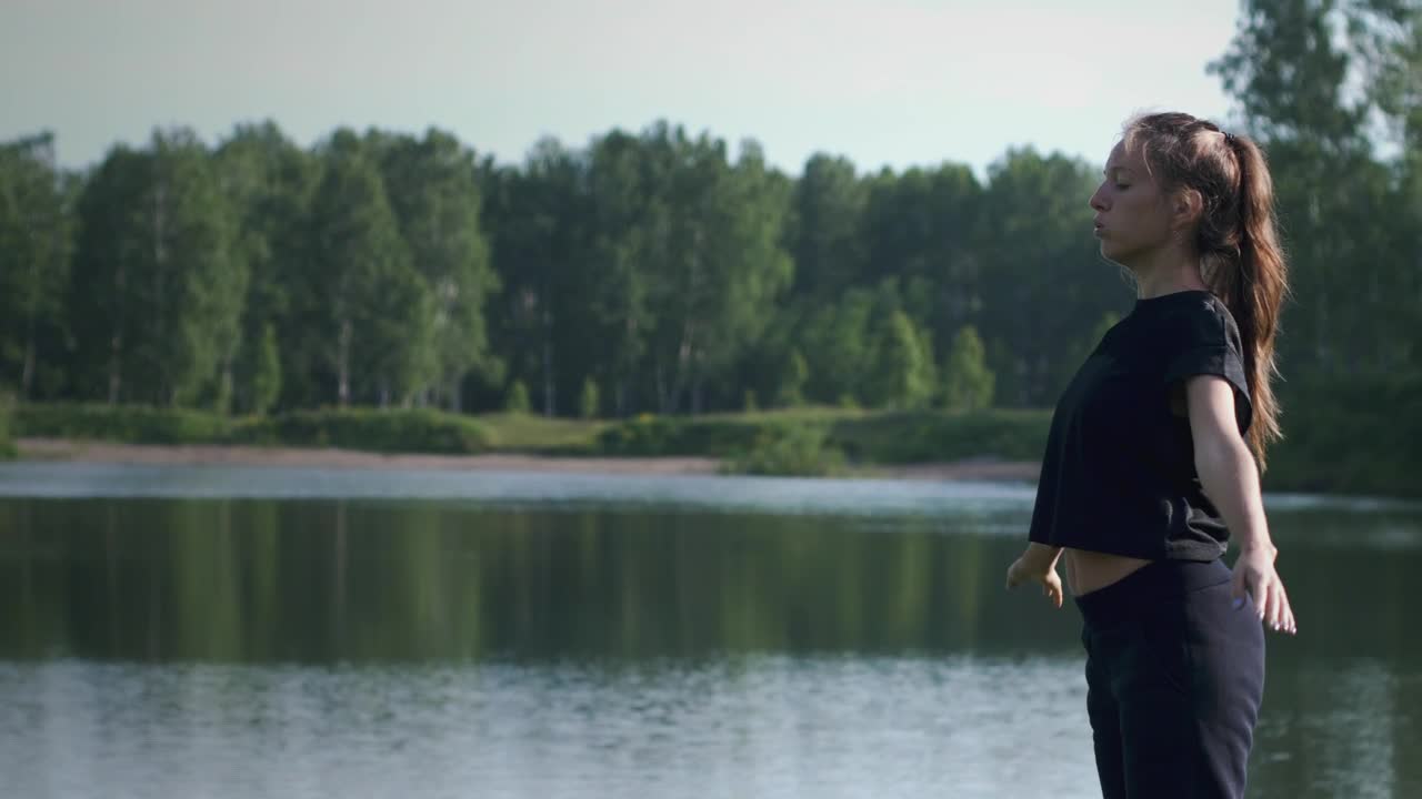 Free Stock Video Woman Practicing Breathing Exercises By The Lake Live Wallpaper