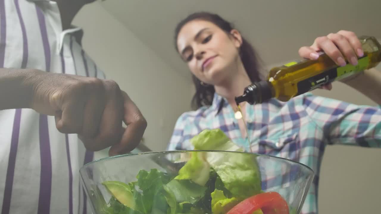 Free Stock Video Woman Pouring Olive Oil Over Salad Live Wallpaper