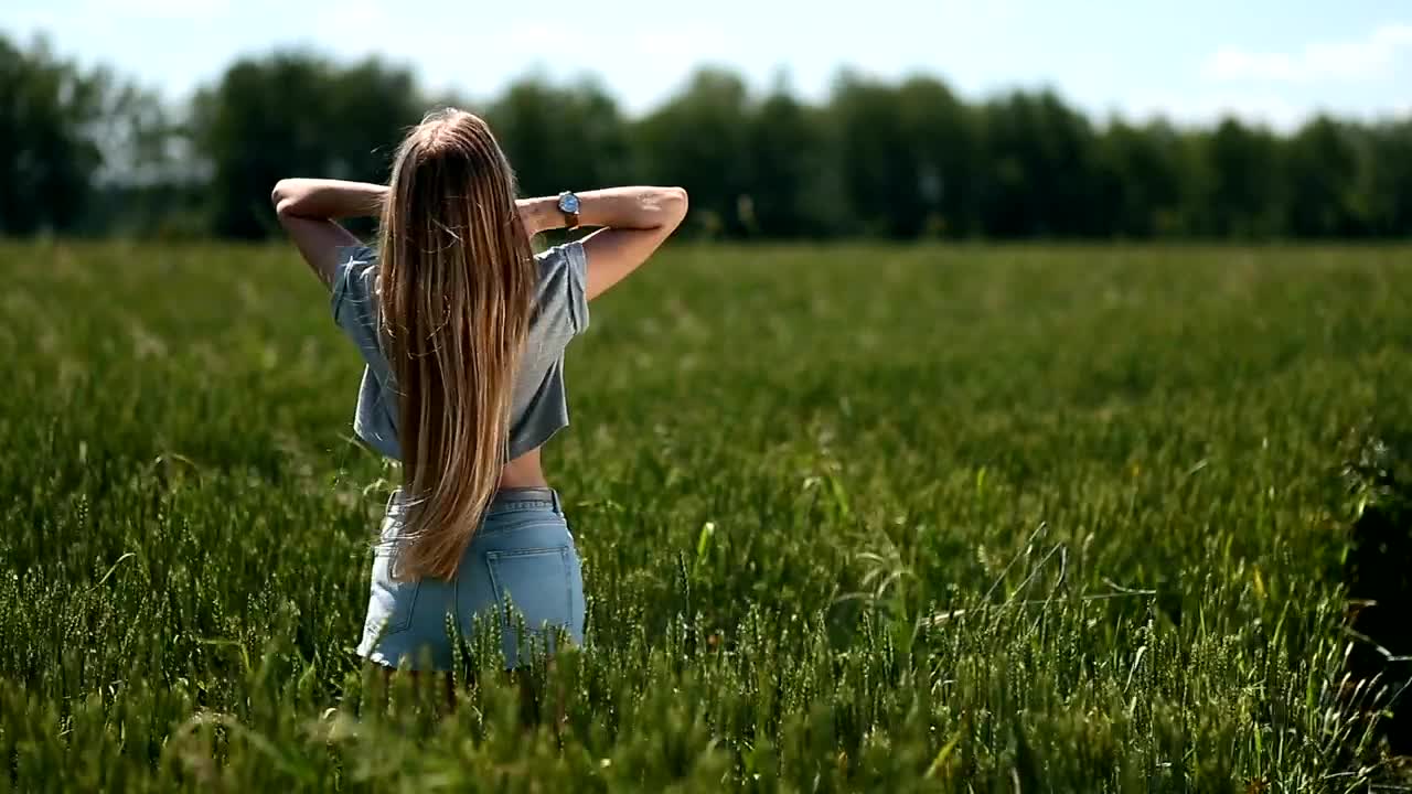 Free Stock Video Woman Playing With Her Hair In The Breeze Live Wallpaper