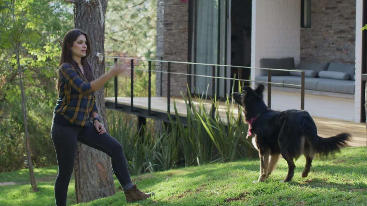 Free Stock Video Woman Playing With A Dog In A Garden Live Wallpaper