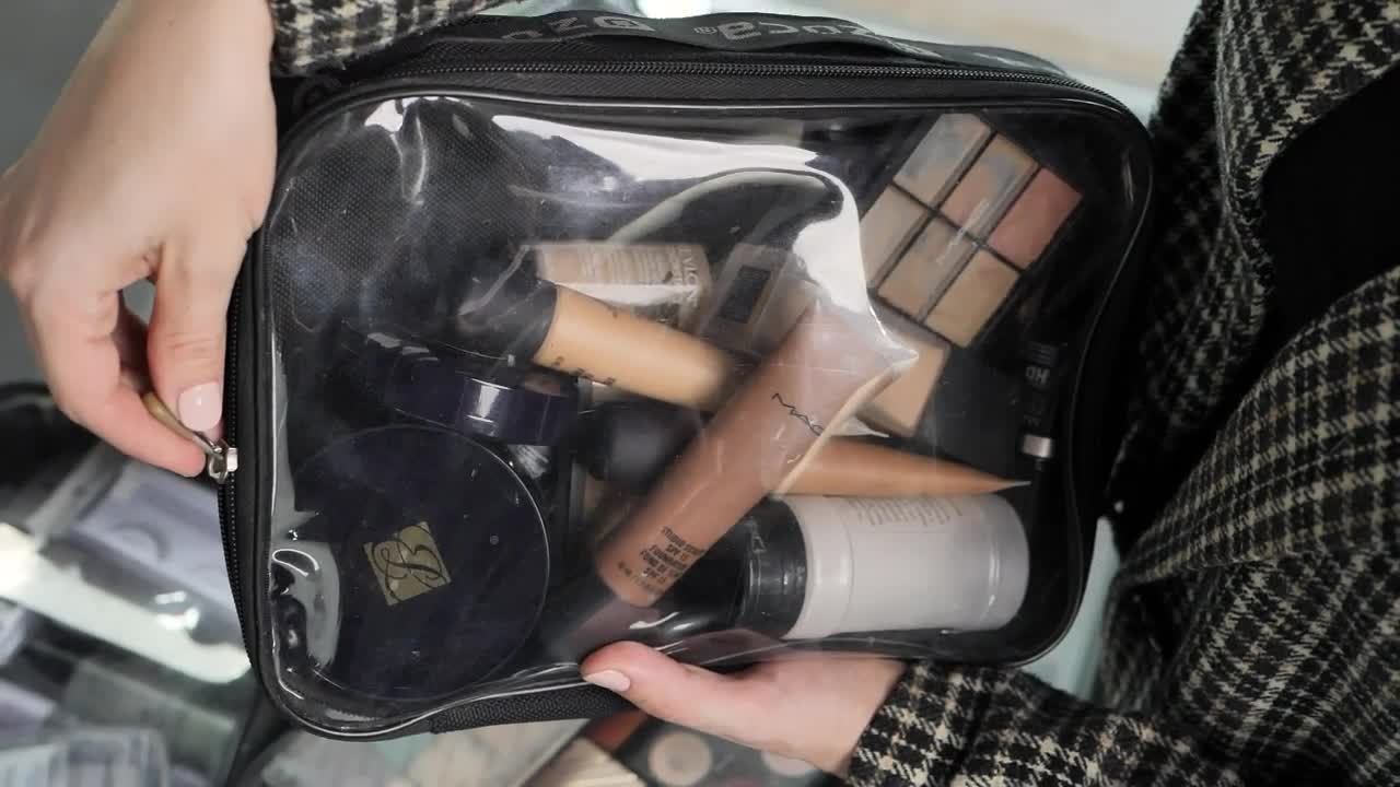 Free Stock Video Woman Opening A Bag With Makeup Live Wallpaper