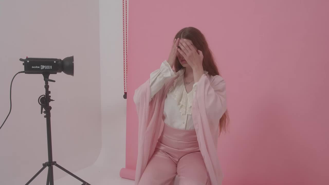 Free Stock Video Woman Modeling During A Photo Shoot Live Wallpaper