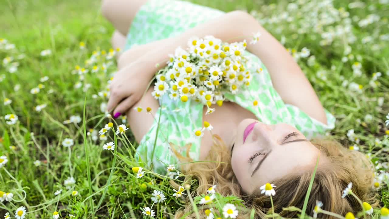 Free Stock Video Woman Lying In The Grass With A Bouquet Of Flowers Live Wallpaper