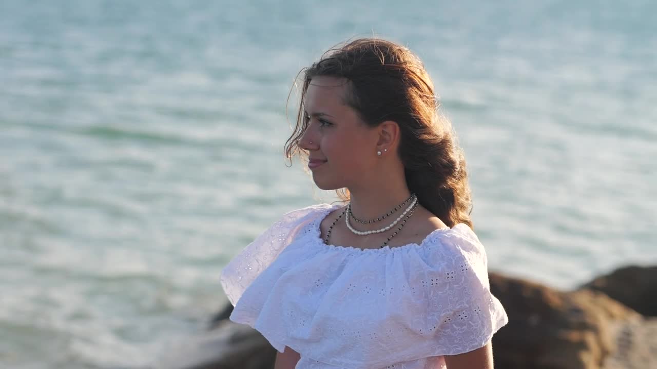 Free Stock Video Woman Looking Out To Sea On The Beach Live Wallpaper