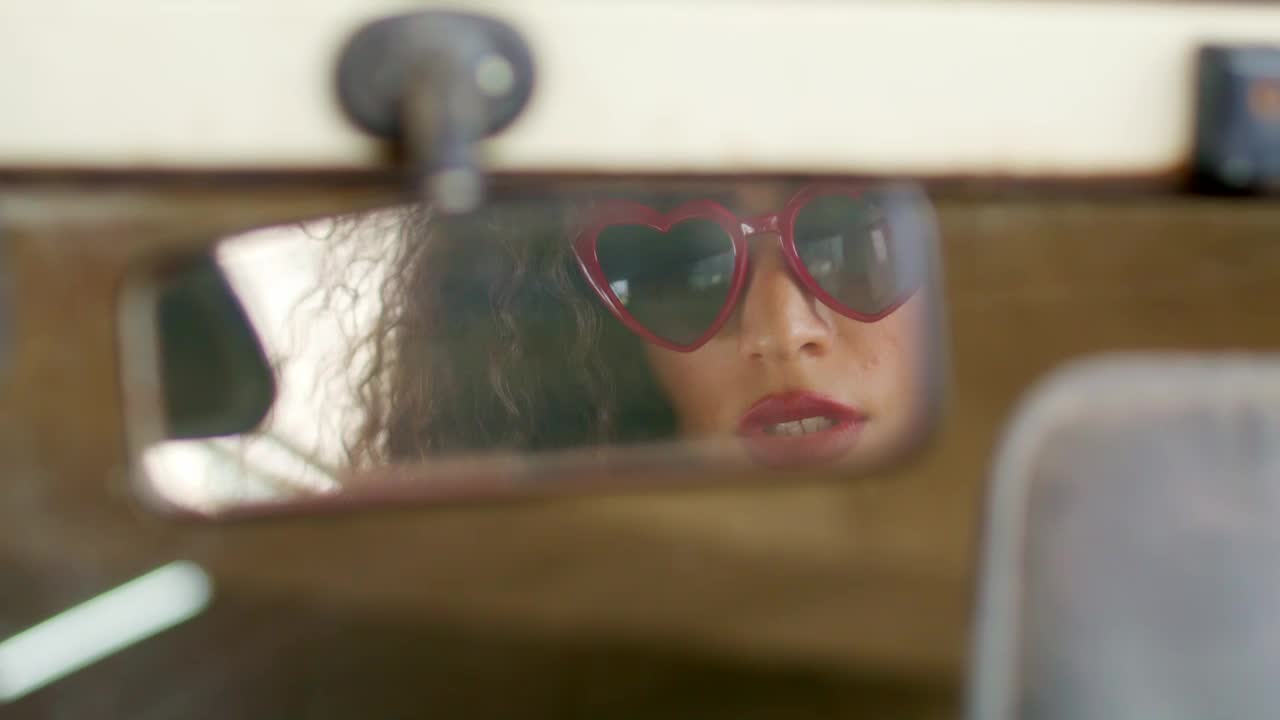 Free Stock Video Woman Looking In Rear View Mirror Live Wallpaper