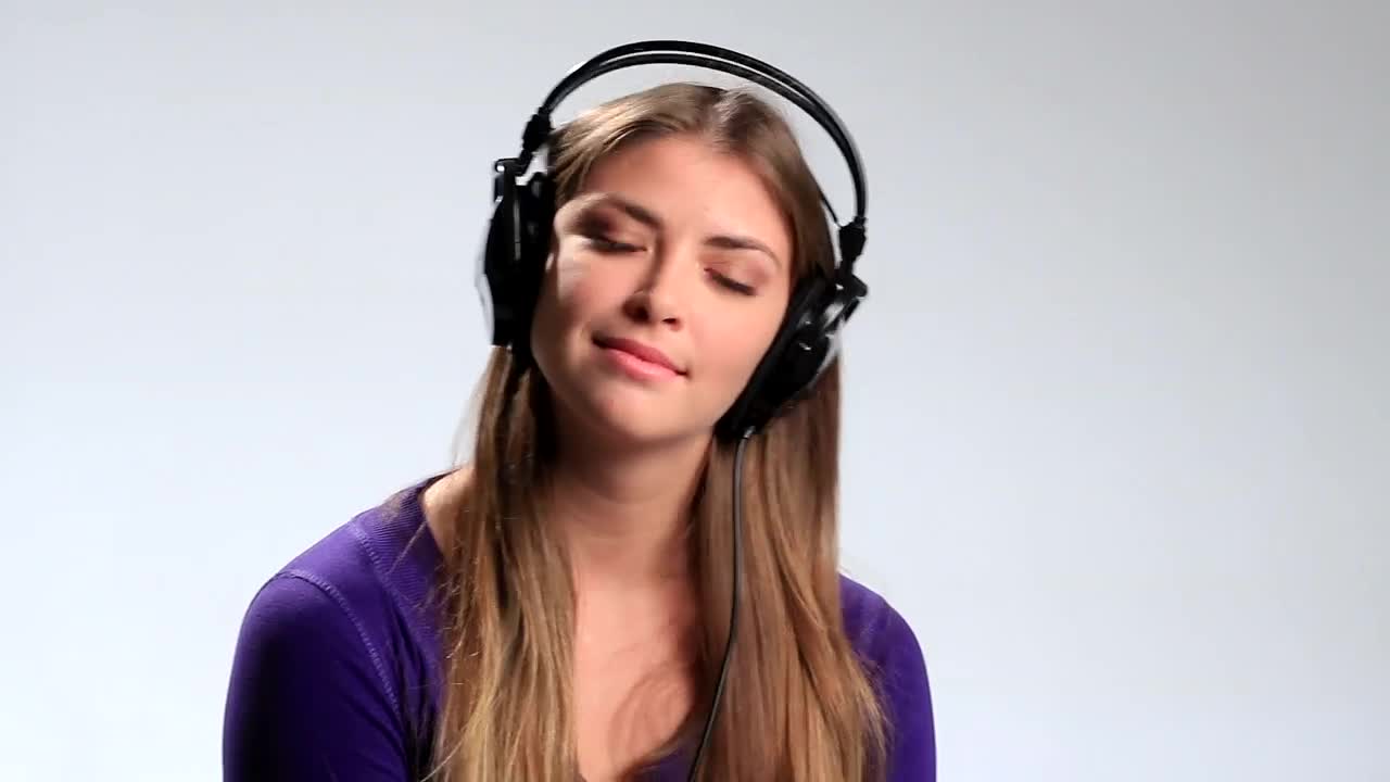 Free Stock Video Woman Listening To Music On Her Headphones Live Wallpaper