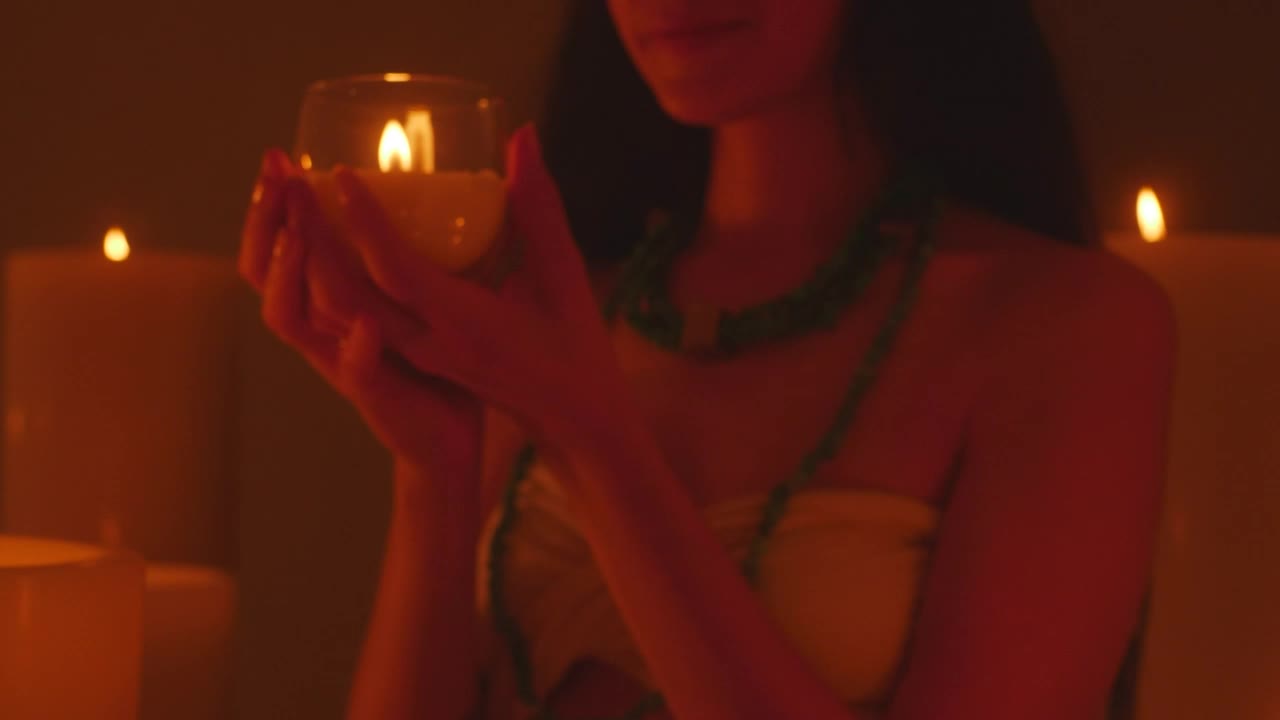 Free Stock Video Woman Laughing Out Loud Looking At A Burning Candle Live Wallpaper