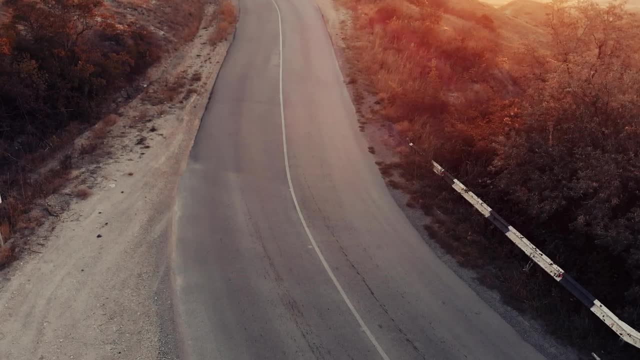 Free Stock Video Woman Jogging Down A Road Seen From The Air Live Wallpaper