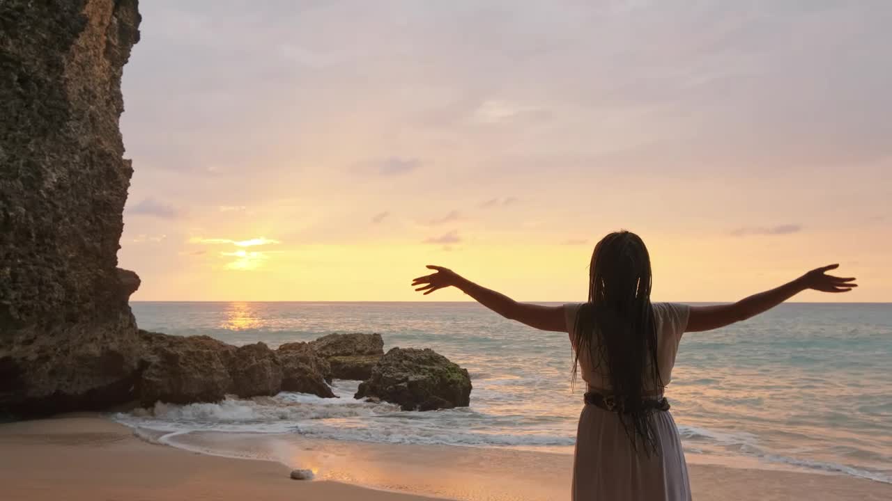 Free Stock Video Woman In White Dress Raises Her Hands On The Beach Live Wallpaper