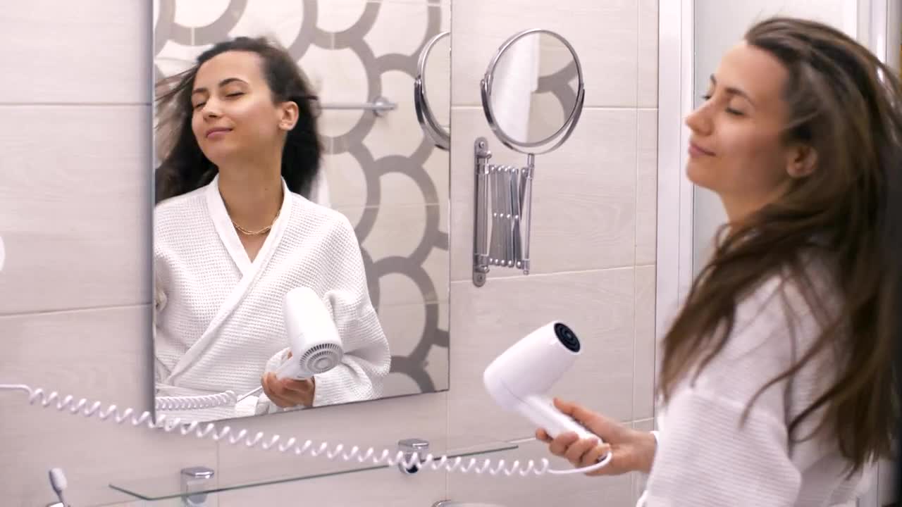 Free Stock Video Woman In Robe Singing Happily In Front Of The Mirror Live Wallpaper