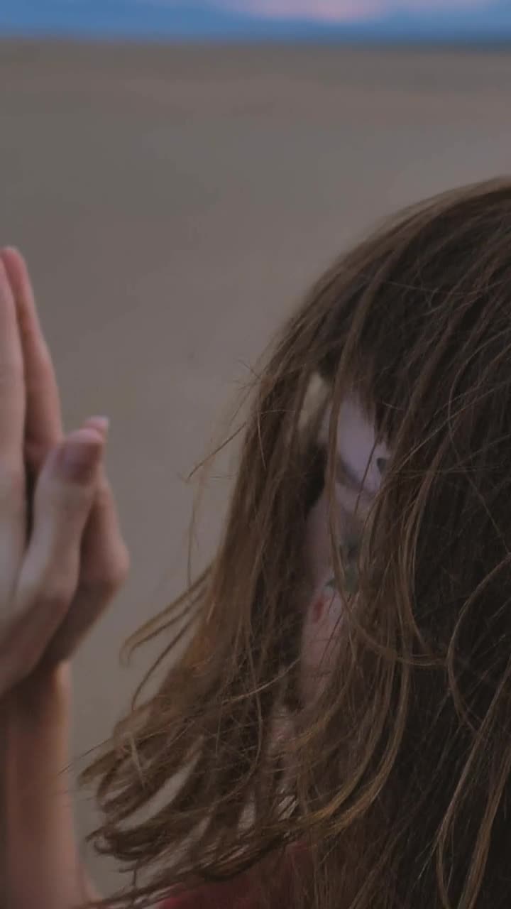 Free Stock Video Woman In Prayer Pose With Her Feet On The Sand Live Wallpaper