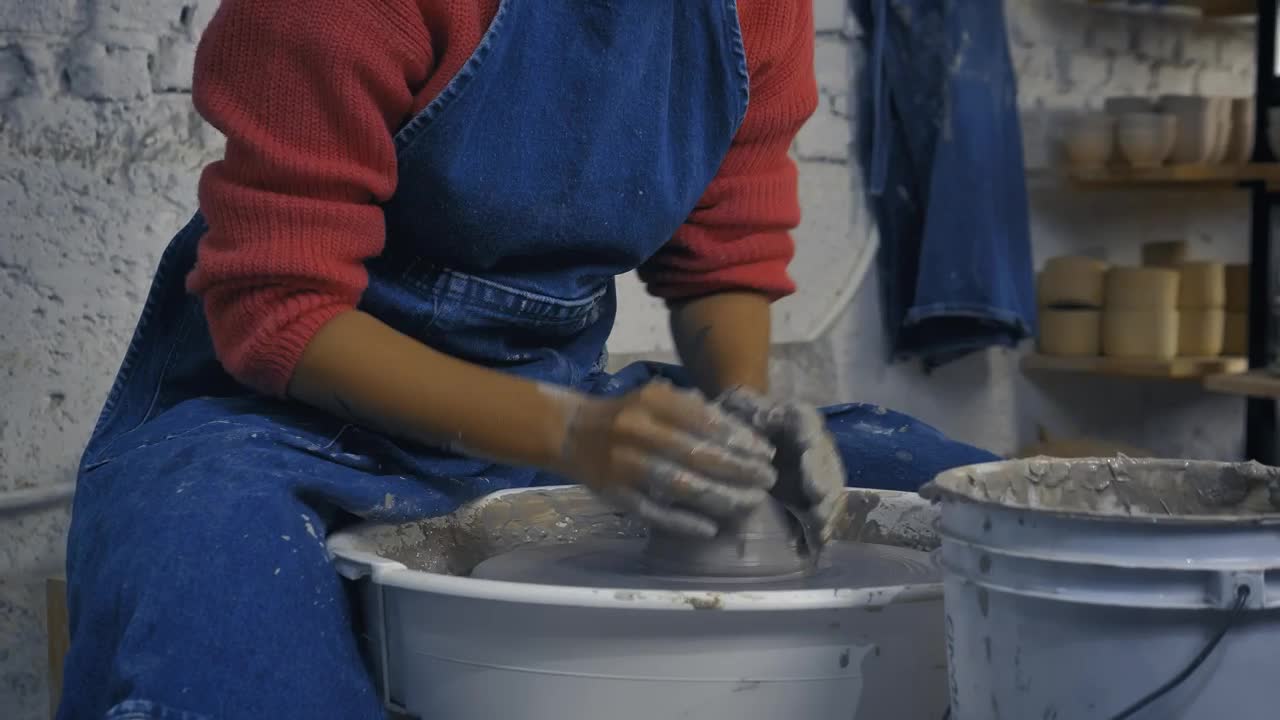 Free Stock Video Woman In A Pottery Workshop Working With Clay Live Wallpaper