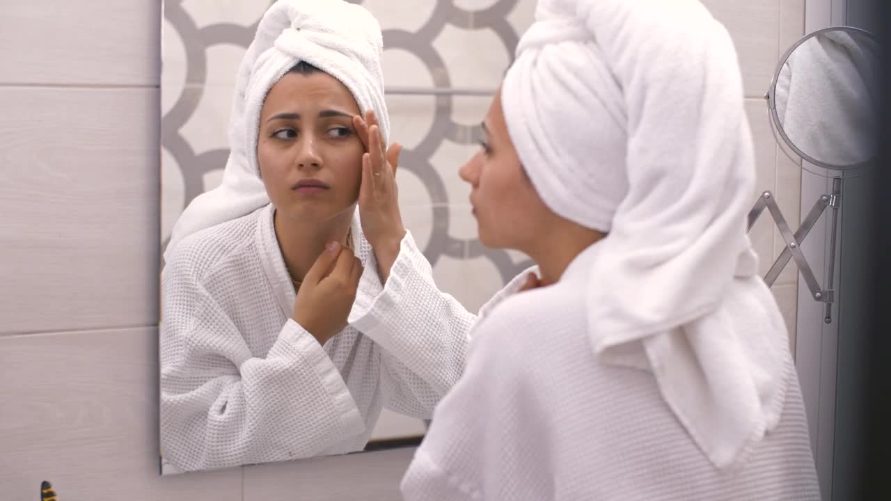 Free Stock Video Woman Frustrated At Seeing Her Face In A Mirror Live Wallpaper