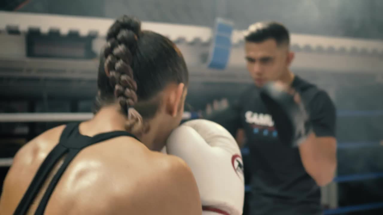 Free Stock Video Woman Doing Kickbox Movements With A Coach Live Wallpaper