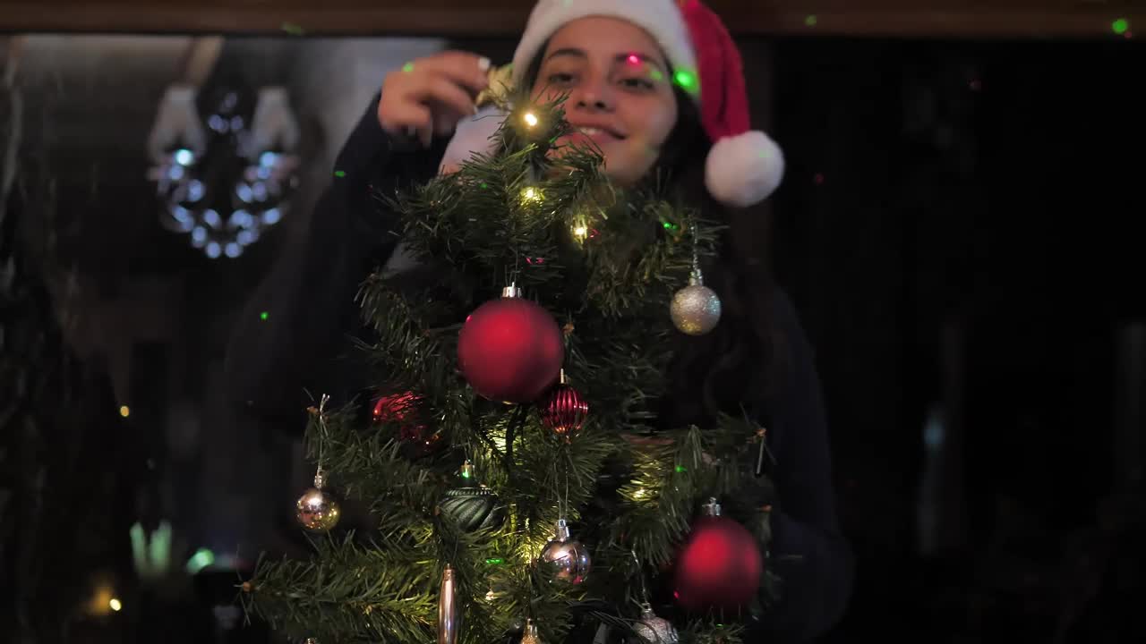 Free Stock Video Woman Decorating A Small Christmas Tree Live Wallpaper