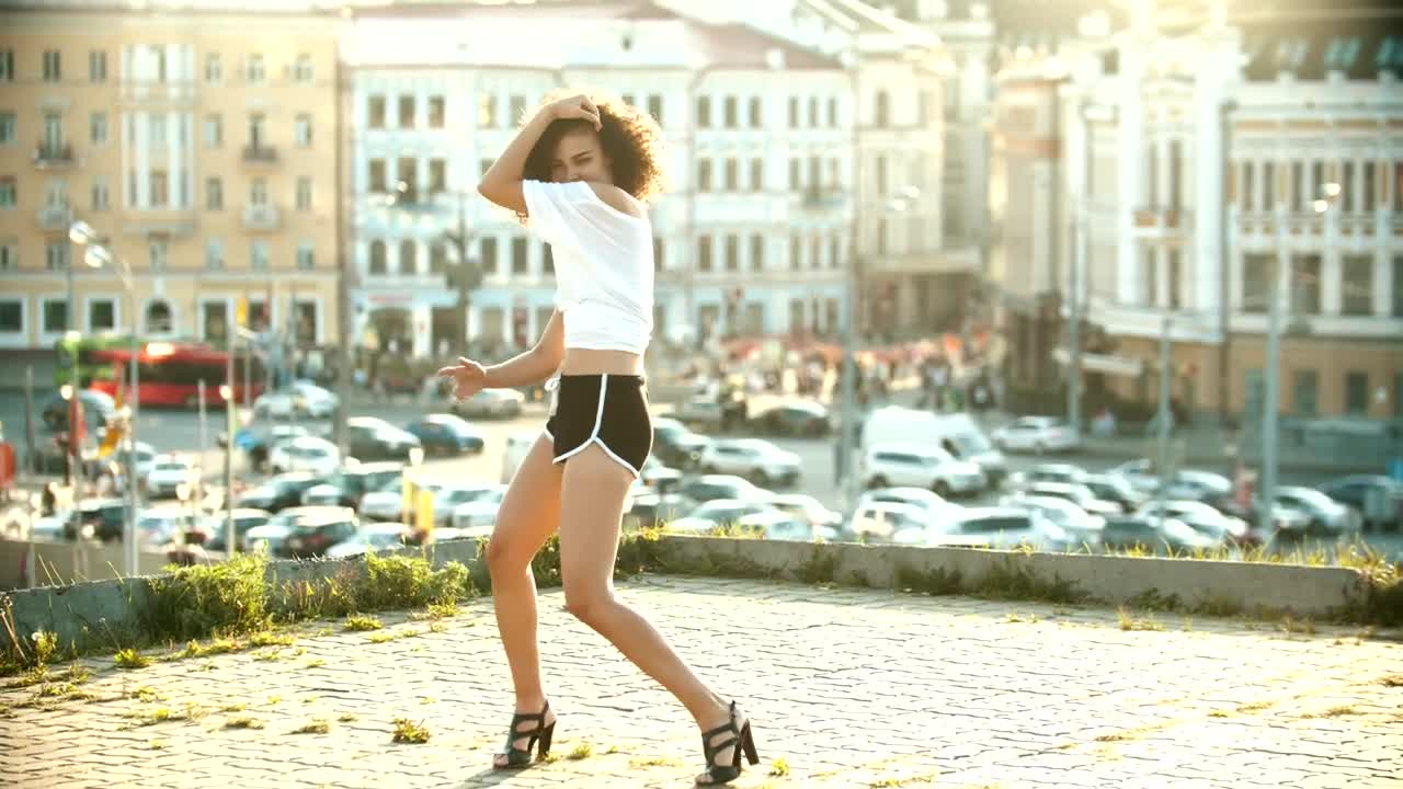 Free Stock Video Woman Dancing On The Roof Of A Building Live Wallpaper