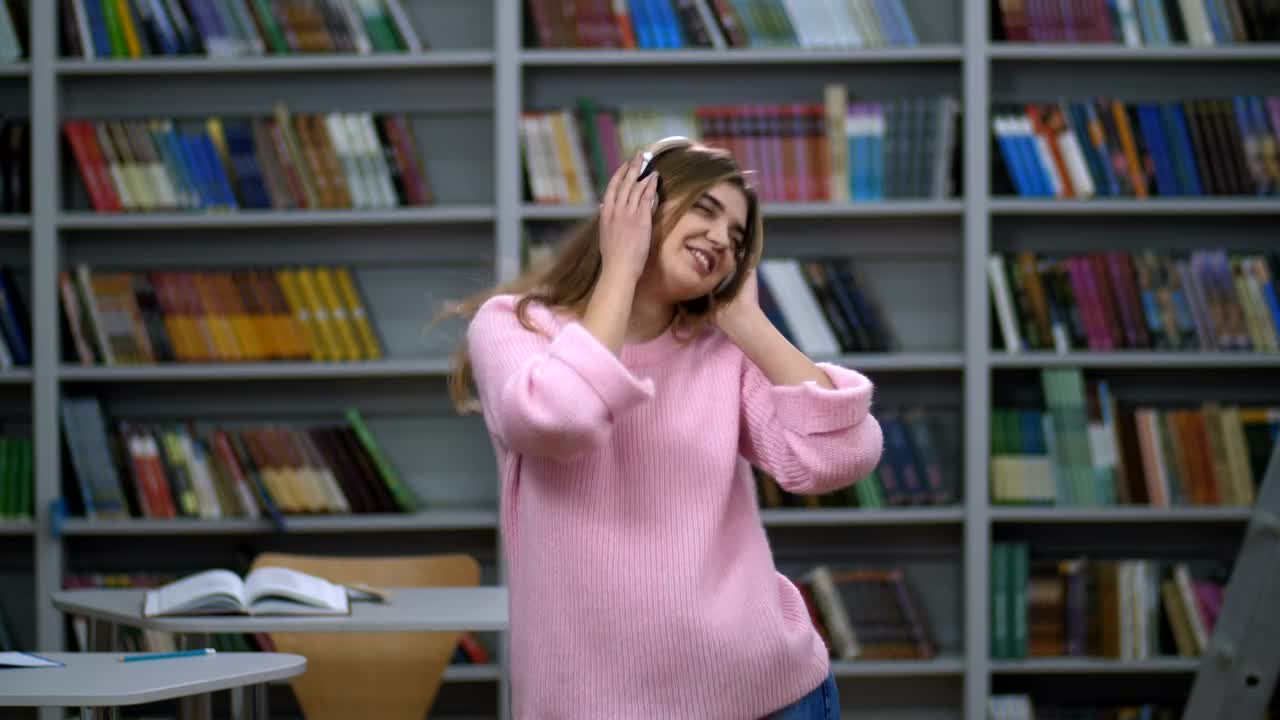 Free Stock Video Woman Dancing To Music From Her Headphones Live Wallpaper