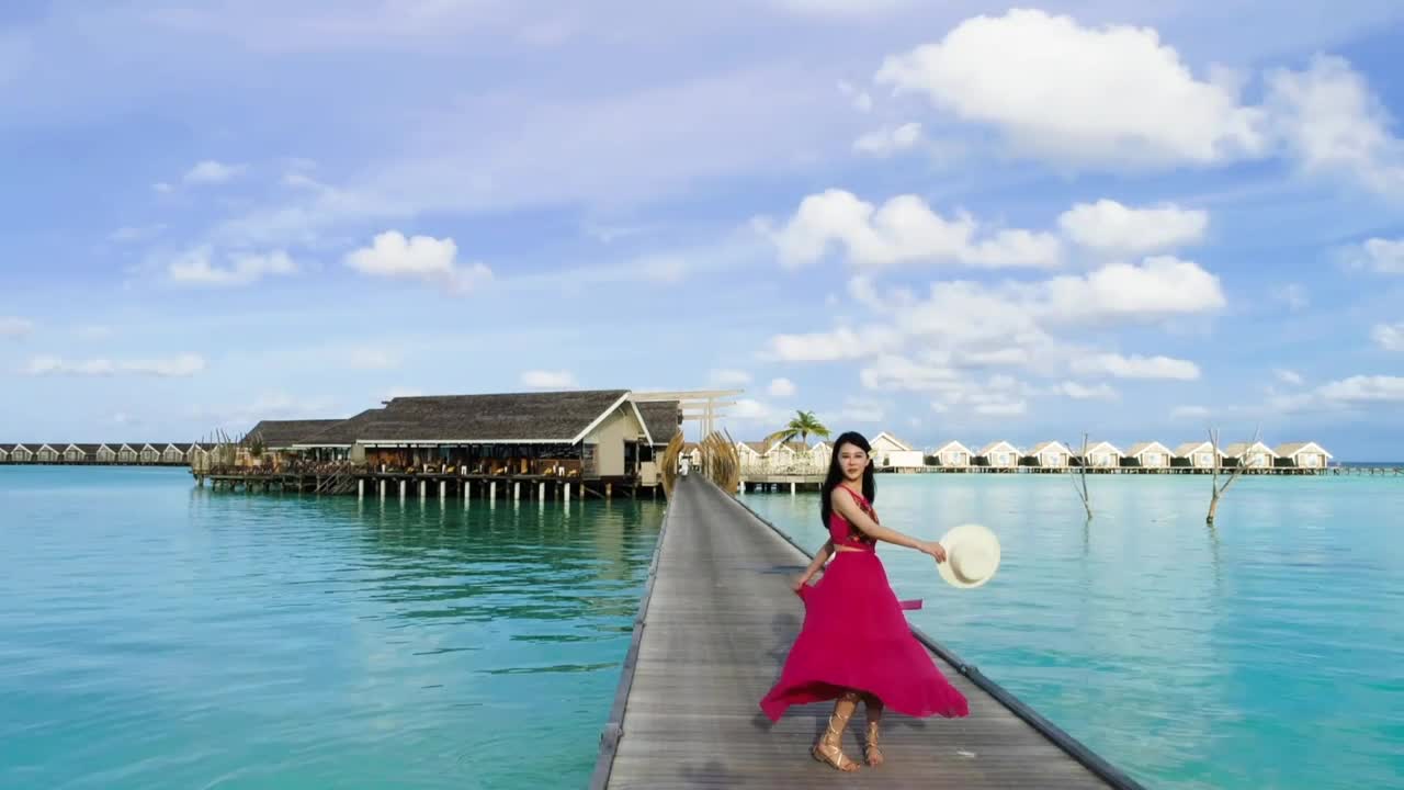 Free Stock Video Woman Dances In Front Of An Ocean Villa Live Wallpaper