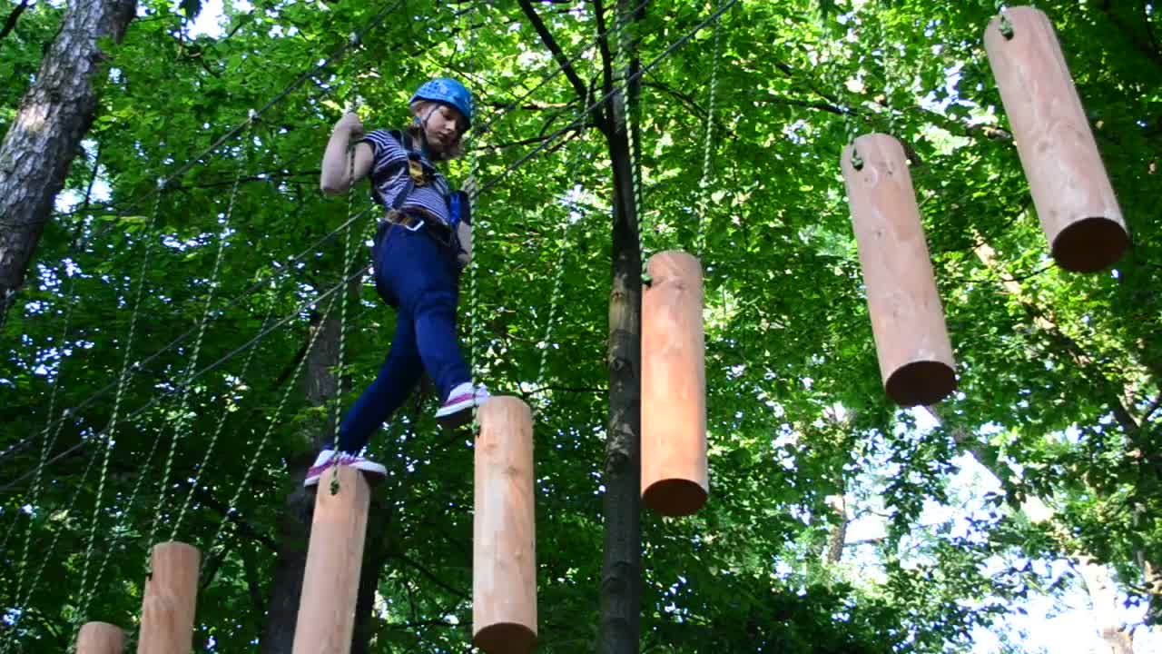 Free Stock Video Woman Crossing An Obstacle Bridge In Nature Live Wallpaper