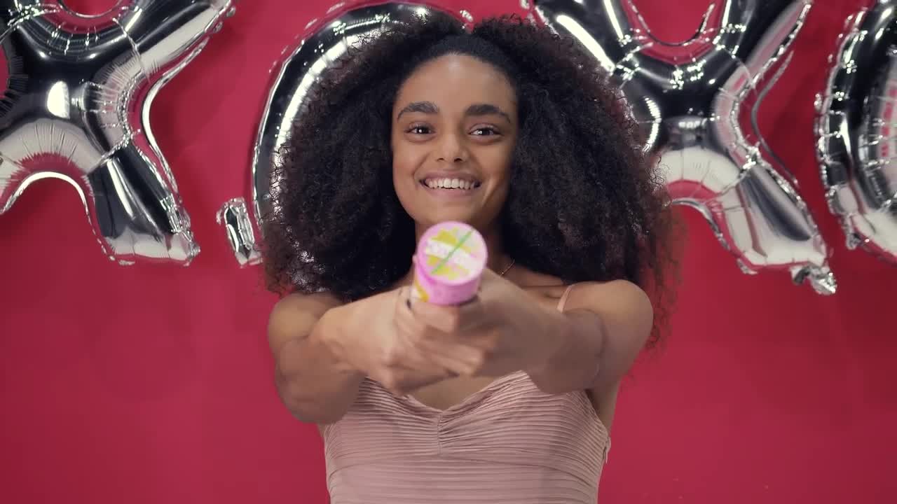Free Stock Video Woman Bursting A Confetti Cannon Live Wallpaper