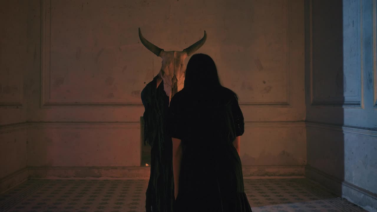Free Stock Video Woman Bows To A Man Who Holds The Skull Of Live Wallpaper