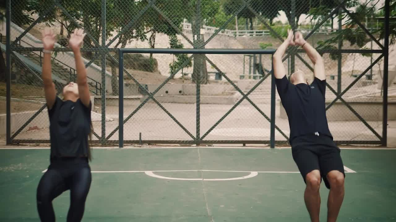 Free Stock Video Woman And Man Doing A Backflip At The Same Time Live Wallpaper