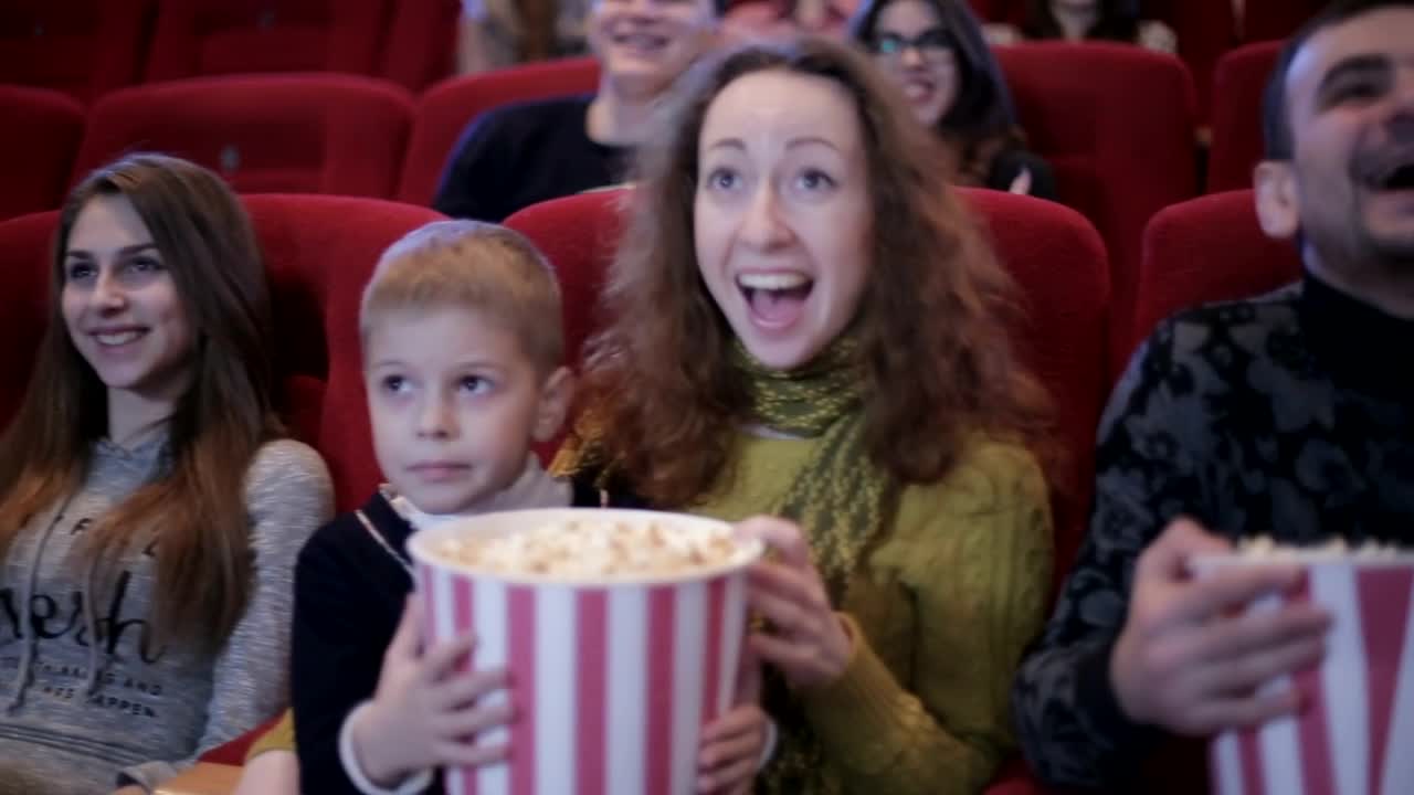 Free Stock Video Whole Family Watching A Funny Movie At The Cinema Live Wallpaper